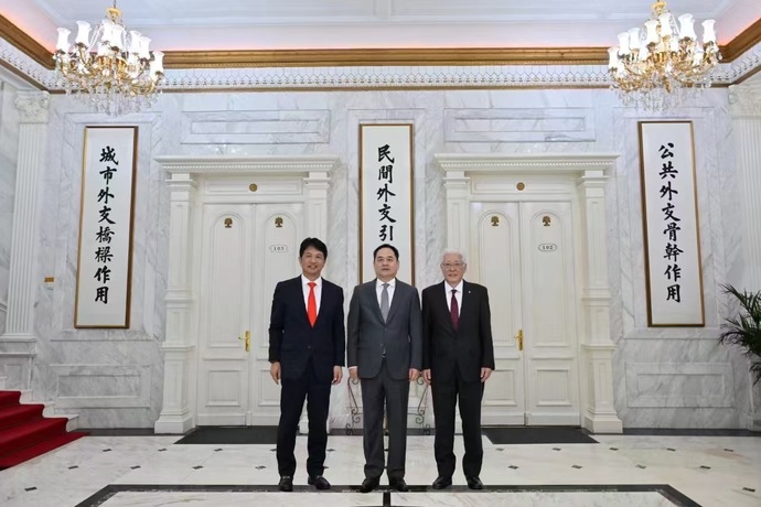 訪中