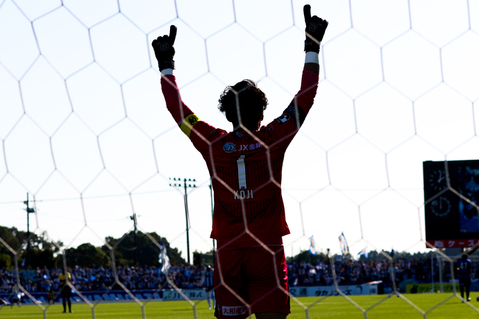 写真：守護神　本間幸司氏